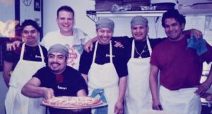 Ken Heimke with Lucca's kitchen staff.